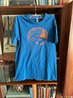 B and the Hive Next Level Apparel Blue Short Sleeve Tee with Orange Graphic